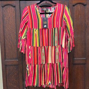 Festive and colorful three tiered top.